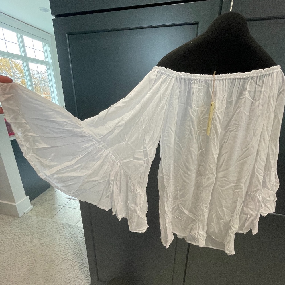White flowing blouse